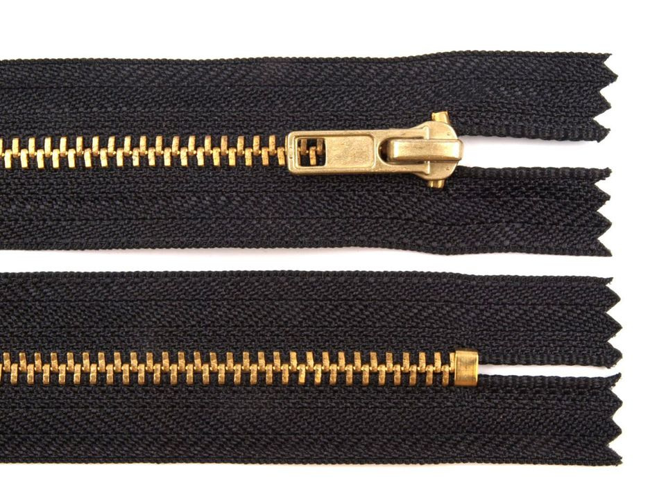 Kovový / mosazný zip šíře 4 mm délka 20 cm kalhotový POL, barva Černá