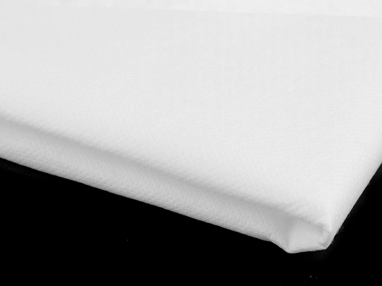 Novolín 80 g/m² šíře 80 cm netkaná textilie nelepicí, barva bílá
