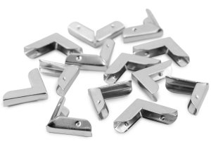 Kovové rohy na ochranu kabelek / diářů