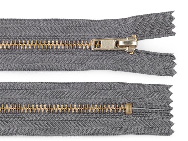 Kovový / mosazný zip šíře 4 mm délka 12 cm kalhotový